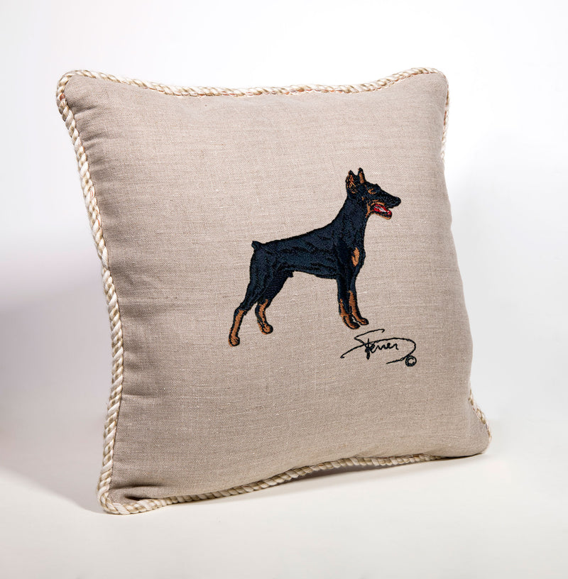Cushion with tab and embroidered motif in Doberman wool